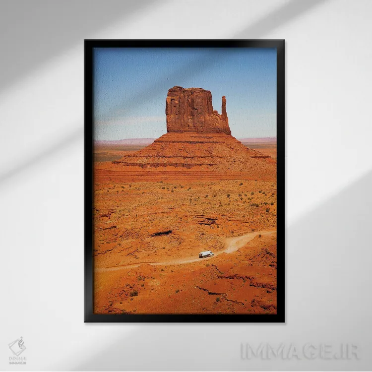 تابلو دکوراتیو Monument Valley,تپه با کامیون، دره یادبود اثر جین ریکس - نمای قابدار مشکی