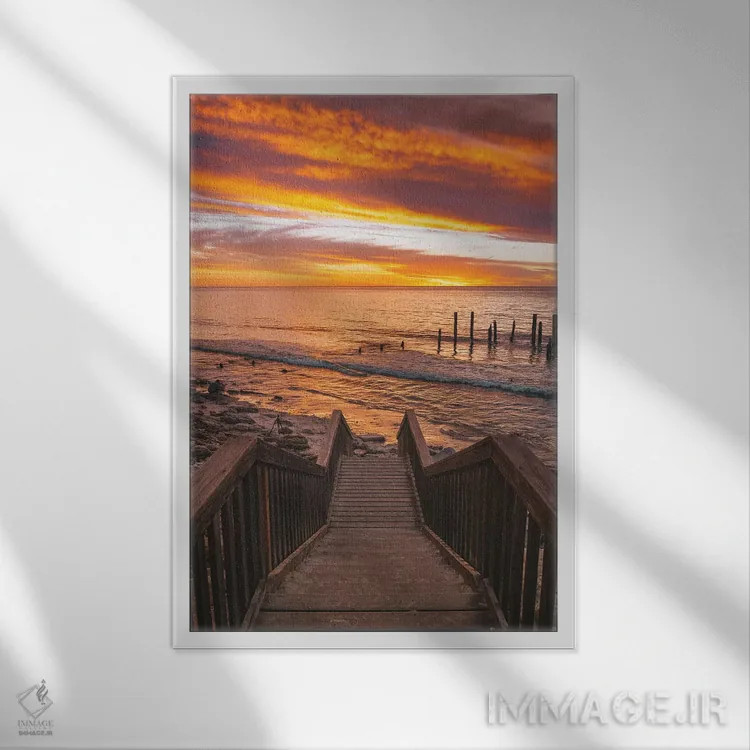 تابلو دکوراتیو پله های کنار ساحل در غروب اثر جیمز وودیکا - نمای قابدار سفید
