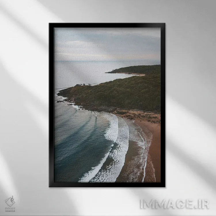 تابلو دکوراتیو نمای هوایی ساحل با حال و هوای خاص اثر جیمز وودیکا - نمای قابدار مشکی