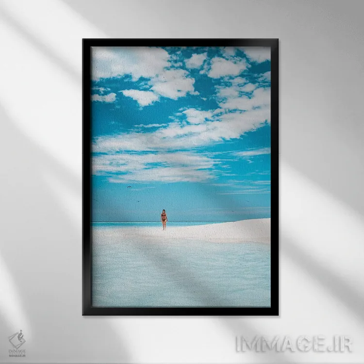 تابلو دکوراتیو دختر در حال پیاده روی در ساحل جزیره بهشت اثر جیمز وودیکا - نمای قابدار مشکی