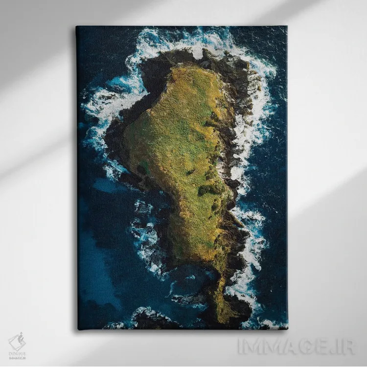 تابلو دکوراتیو نمای هوایی ساحل جزیره سنگی اثر جیمز وودیکا - نمای روبهرو روی دیوار