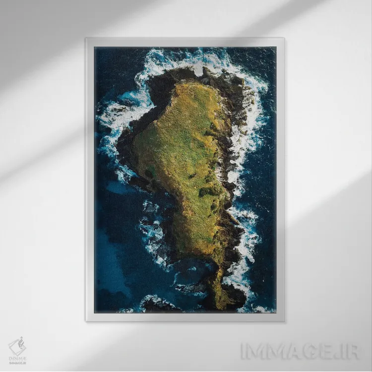 تابلو دکوراتیو نمای هوایی ساحل جزیره سنگی اثر جیمز وودیکا - نمای قابدار سفید