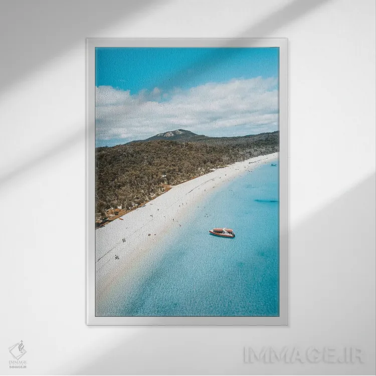 تابلو دکوراتیو نمای هوایی ساحل جزیره با آب آبی و شن سفید اثر جیمز وودیکا - نمای قابدار سفید
