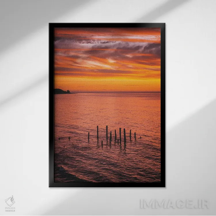 تابلو دکوراتیو پایه های اسکله در غروب اثر جیمز وودیکا - نمای قابدار مشکی