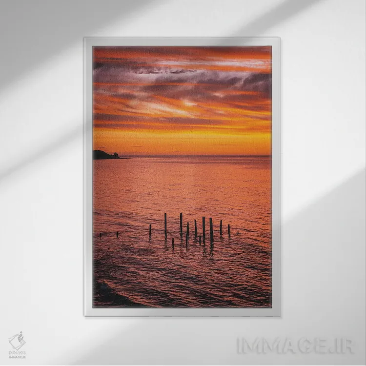 تابلو دکوراتیو پایه های اسکله در غروب اثر جیمز وودیکا - نمای قابدار سفید