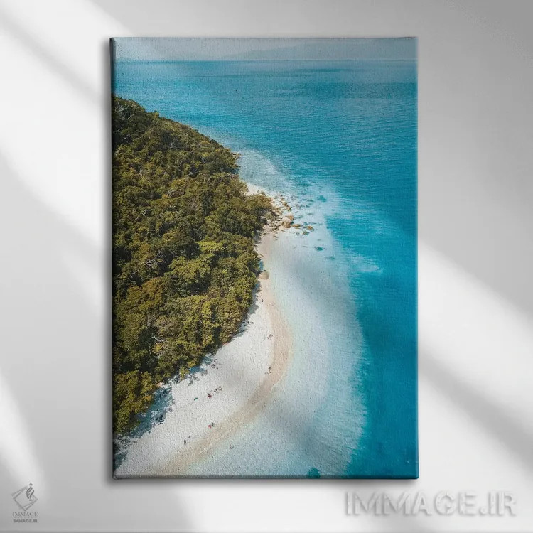 تابلو دکوراتیو نمای هوایی ساحل جزیره گرمسیری اثر جیمز وودیکا - نمای روبهرو روی دیوار