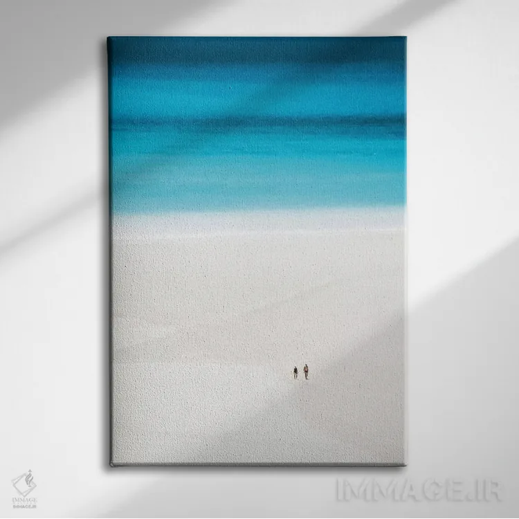 تابلو دکوراتیو پیاده روی زوج در ساحل سفید و دنج اثر جیمز وودیکا - نمای روبهرو روی دیوار