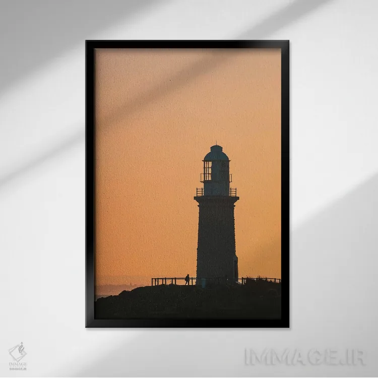 تابلو دکوراتیو سیلوئت فانوس دریایی در غروب اثر جیمز وودیکا - نمای قابدار مشکی