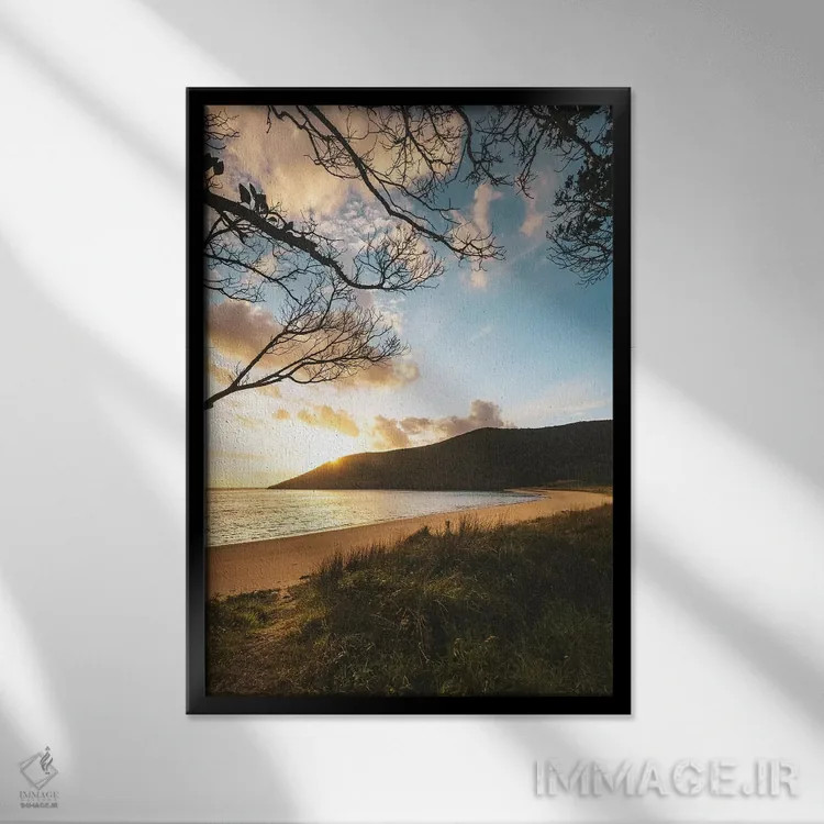 تابلو دکوراتیو غروب آرام در کنار ساحل اثر جیمز وودیکا - نمای قابدار مشکی