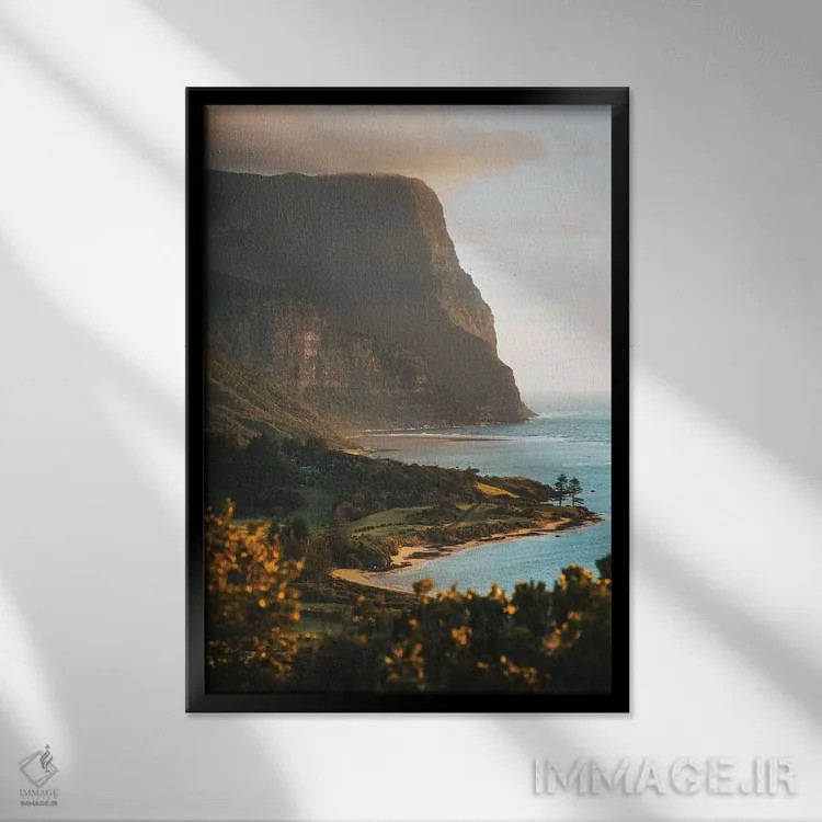 تابلو دکوراتیو سکوی تماشای غروب ساحل جزیره آتشفشانی اثر جیمز وودیکا - نمای قابدار مشکی