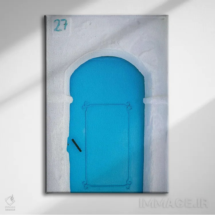 تابلو دکوراتیو Morocco, Chefchaouen. Blue door in white building.,آفریقا، م… اثر جینز گالری - نمای روبهرو روی دیوار