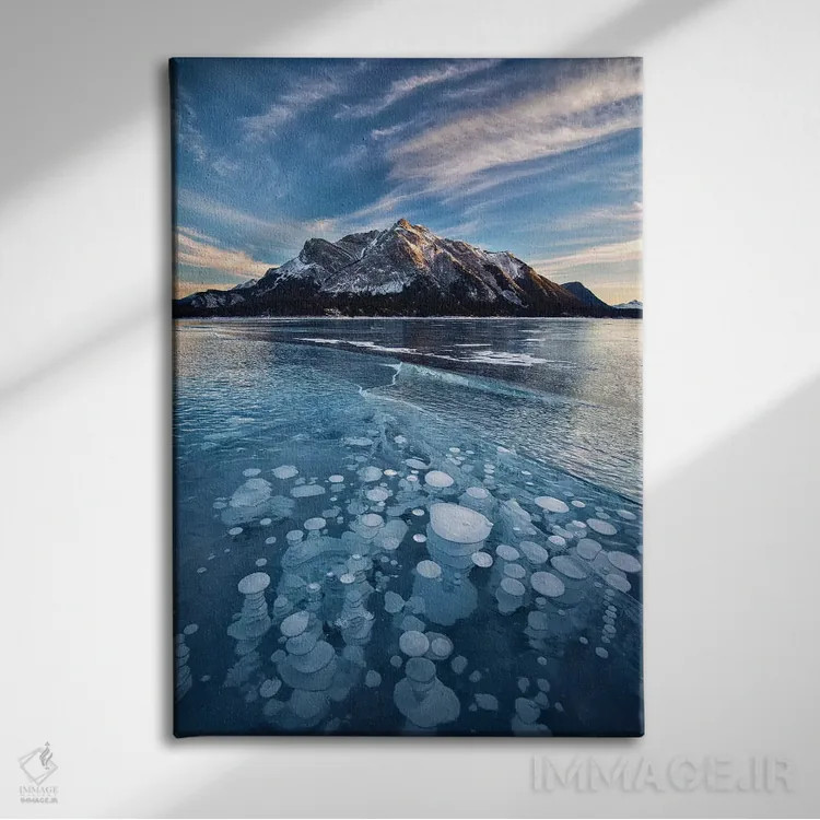 تابلو دکوراتیو Alberta, Abraham Lake. Ice bubbles in lake at sunset.,کانادا… اثر جینز گالری - نمای روبهرو روی دیوار