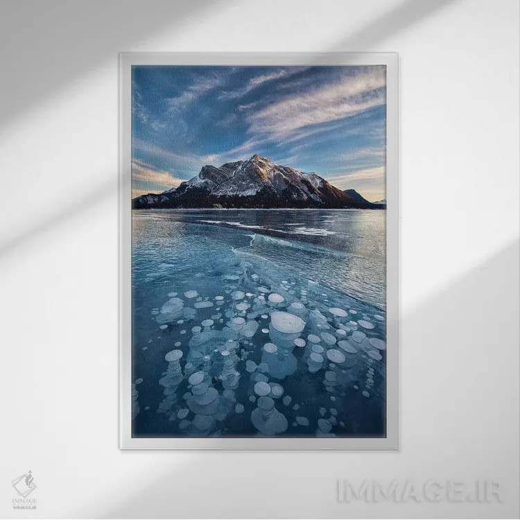 تابلو دکوراتیو Alberta, Abraham Lake. Ice bubbles in lake at sunset.,کانادا… اثر جینز گالری - نمای قابدار سفید