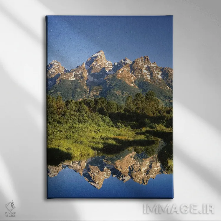 تابلو دکوراتیو Wyoming, Grand Teton National Park. Grand Tetons reflect in… اثر جینز گالری - نمای روبهرو روی دیوار