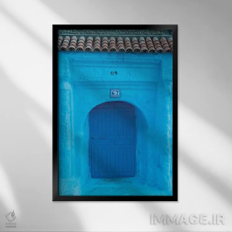 تابلو دکوراتیو Morocco, Chefchaouen. Arch Over Wooden Door.,آفریقا، مراکش… اثر جینز گالری - نمای قابدار مشکی
