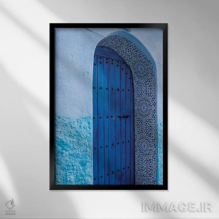 تابلو دکوراتیو Morocco, Chefchaouen. Arch Over Wooden Door.,آفریقا، مراکش… اثر جینز گالری - نمای قابدار مشکی