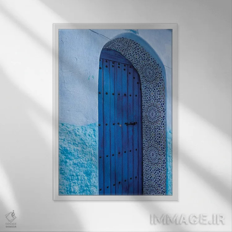 تابلو دکوراتیو Morocco, Chefchaouen. Arch Over Wooden Door.,آفریقا، مراکش… اثر جینز گالری - نمای قابدار سفید