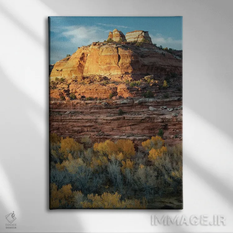 تابلو دکوراتیو Utah. Last light on sandstone monolith with autumn cottonw… اثر جودیت زیمرمن - نمای روبهرو روی دیوار