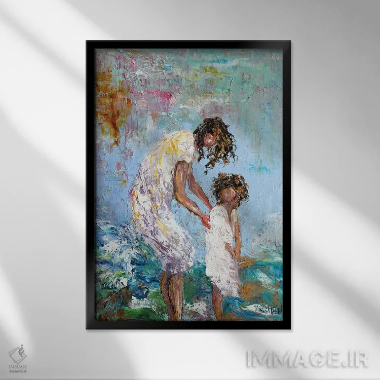 تابلو دکوراتیو مادر و کودک در ساحل اثر کارن تارلتون - نمای قابدار مشکی