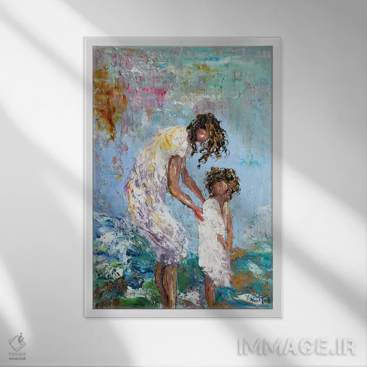 تابلو دکوراتیو مادر و کودک در ساحل اثر کارن تارلتون - نمای قابدار سفید