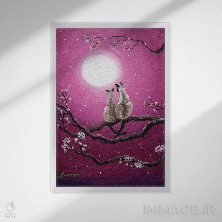 تابلو دکوراتیو گربه های سیامی در شکوفه های بهاری اثر لورا ایورسن - نمای قابدار سفید