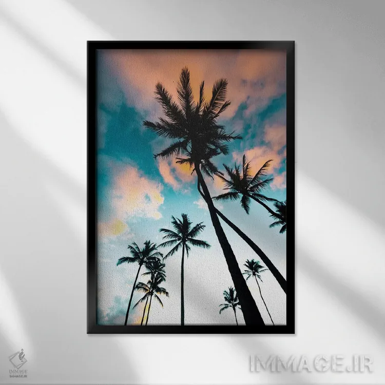 تابلو دکوراتیو طلوع خورشید در میان نخل ها اثر لوکاس مور - نمای قابدار مشکی