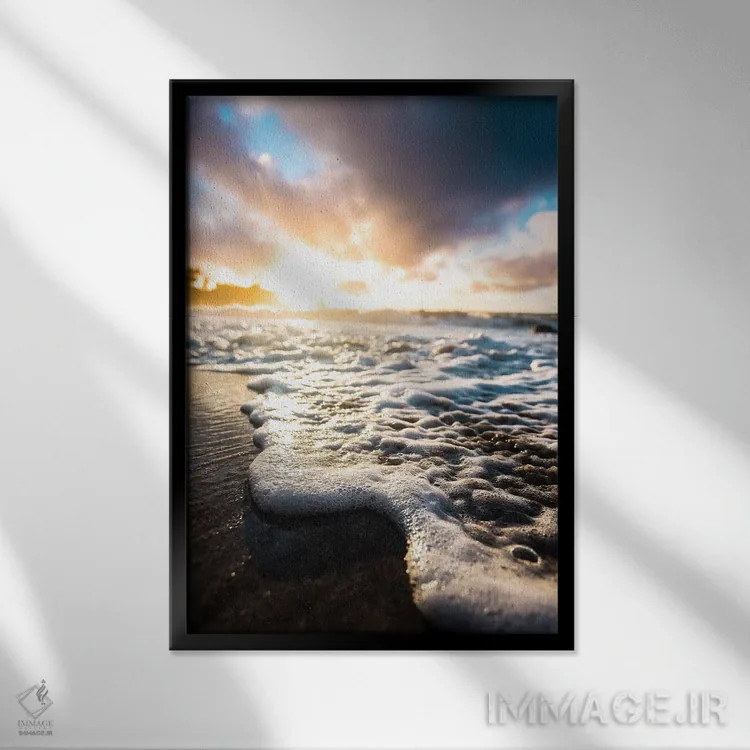 تابلو دکوراتیو طلوع فوم دریا اثر لوکاس مور - نمای قابدار مشکی