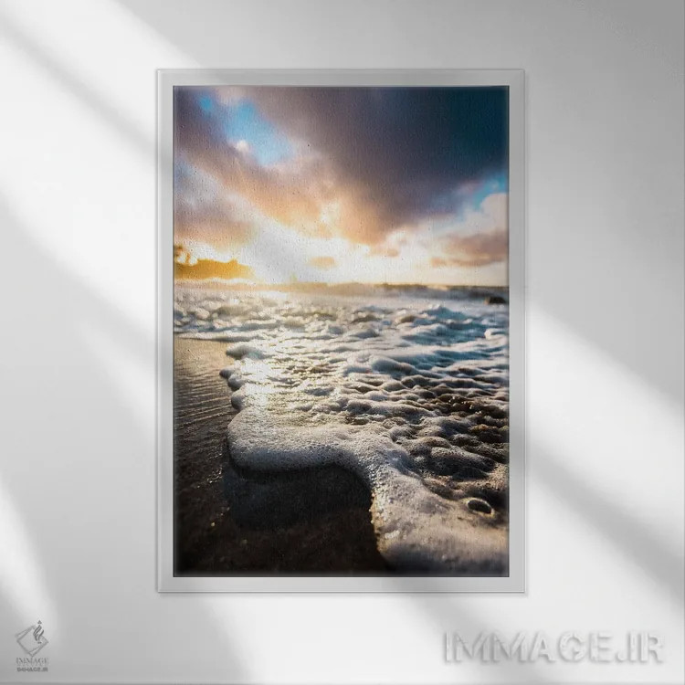 تابلو دکوراتیو طلوع فوم دریا اثر لوکاس مور - نمای قابدار سفید