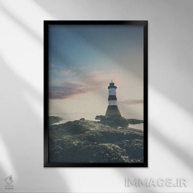 تابلو دکوراتیو فانوس دریایی پنروز هنگام طلوع آفتاب اثر لورا ایوانز - نمای قابدار مشکی