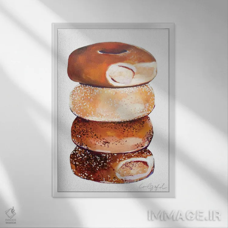 تابلو دکوراتیو روی هم چیده شدن بیگل ها اثر لورل گرینفیلد - نمای قابدار سفید