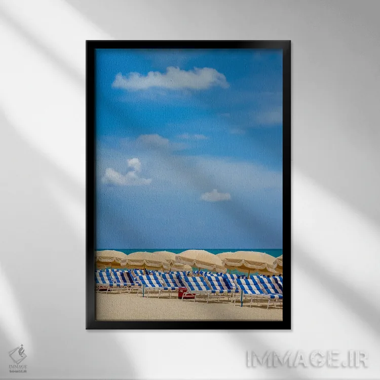 تابلو دکوراتیو صحنه ای آرامش بخش از ساحل اثر ملانی ویولا - نمای قابدار مشکی