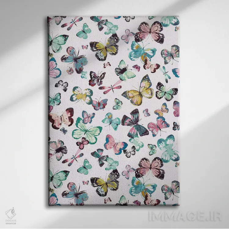 تابلو دکوراتیو پروانه های آبرنگی صورتی و سبز اثر نینولا دیزاین - نمای روبهرو روی دیوار