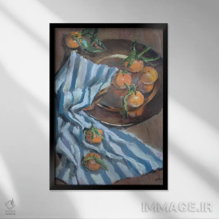 تابلو دکوراتیو پرتقال ها و پارچه اثر نیتیا سوامیناتان - نمای قابدار مشکی