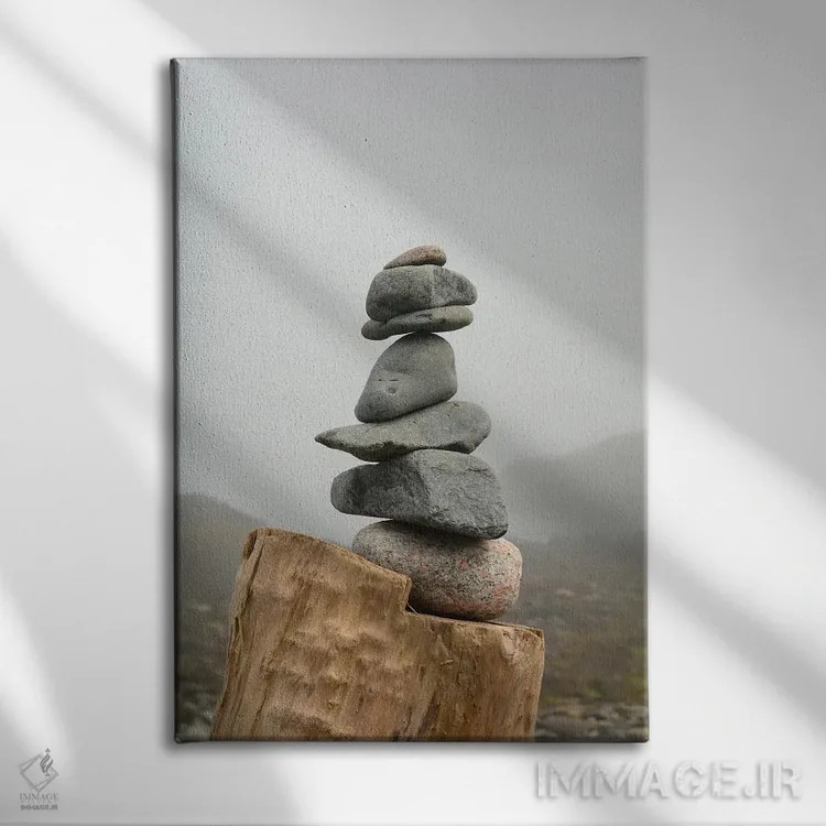 تابلو دکوراتیو توده سنگ روی ساحل مه آلود اثر اولیویا جوی سنت کلر - نمای روبهرو روی دیوار