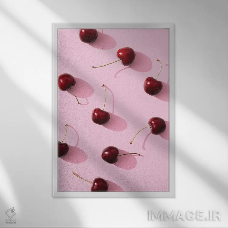 تابلو دکوراتیو آلبالو روی زمینه صورتی اثر استودیو ۱ایکس ۲ - نمای قابدار سفید