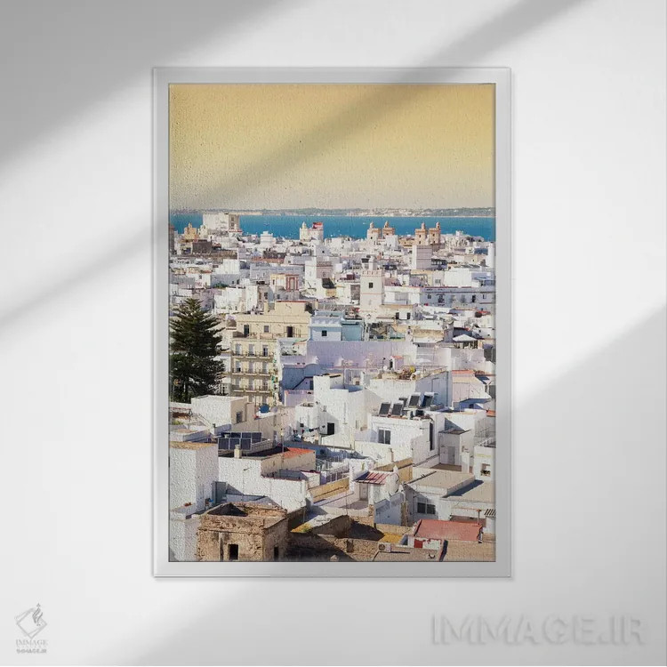 تابلو دکوراتیو "شهر سفید کادیز در غروب" اثر فیلیپ هوگونار - نمای قابدار سفید