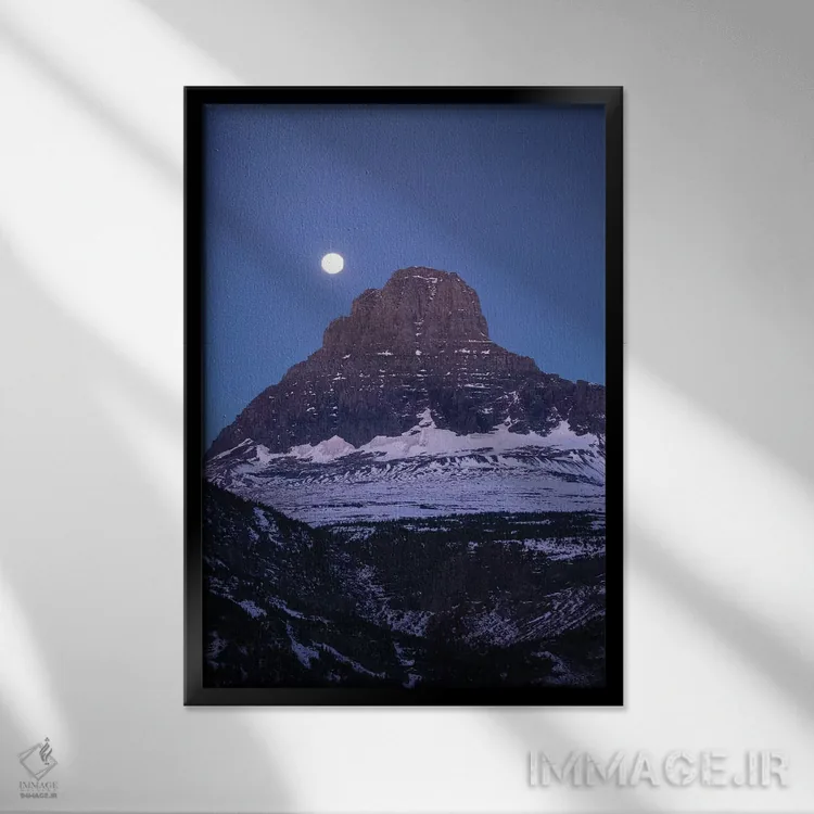 تابلو دکوراتیو Glacier National Park, Montana, USA" - "ماه بر فراز قله… اثر پانورامیک ایمجز - نمای قابدار مشکی