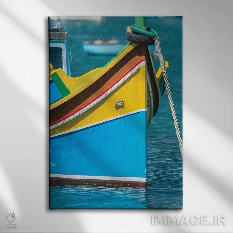تابلو دکوراتیو Marsaxlokk, traditional fishing boat,مالت، مرزاکسلوک، قایق ماه… اثر راب تیلی - نمای روبهرو روی دیوار