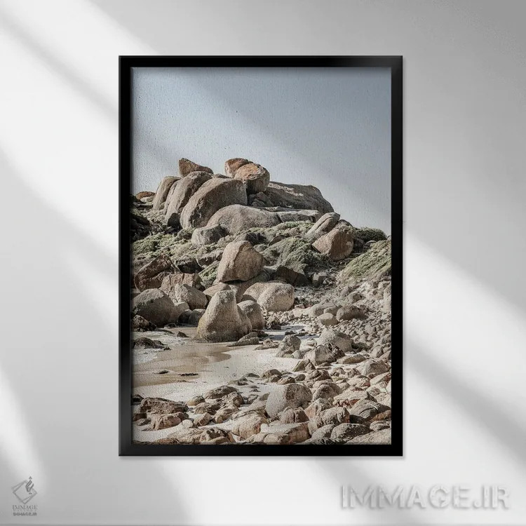 تابلو دکوراتیو ساحل صخره ای ۲ اثر عکس های کلینت - نمای قابدار مشکی