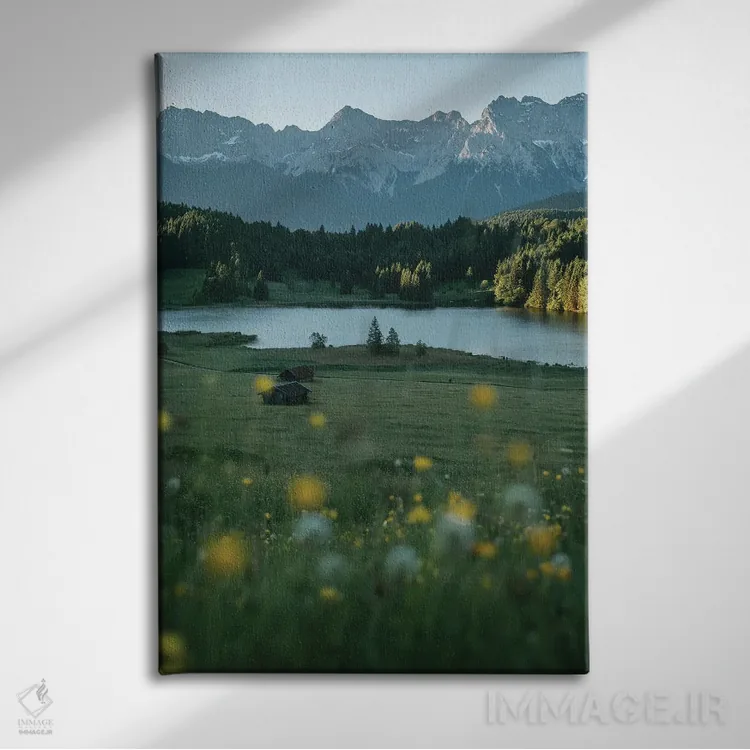 تابلو دکوراتیو مرغزار دریاچه کوهستانی آرام هنگام طلوع خورشید اثر مایکل شاور - نمای روبهرو روی دیوار