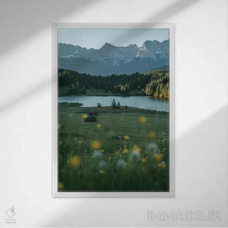 تابلو دکوراتیو مرغزار دریاچه کوهستانی آرام هنگام طلوع خورشید اثر مایکل شاور - نمای قابدار سفید