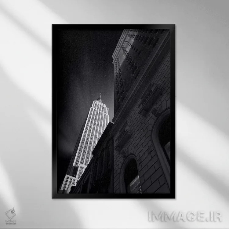 تابلو دکوراتیو آسمان خراش نیویورک به صورت سیاه و سفید اثر سباستین دل گروسو - نمای قابدار مشکی