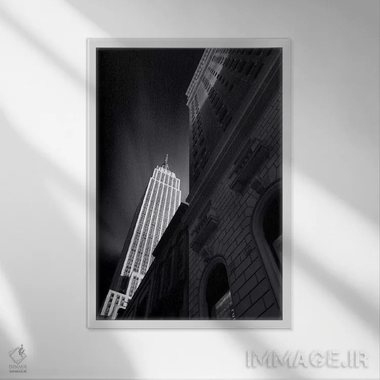 تابلو دکوراتیو آسمان خراش نیویورک به صورت سیاه و سفید اثر سباستین دل گروسو - نمای قابدار سفید