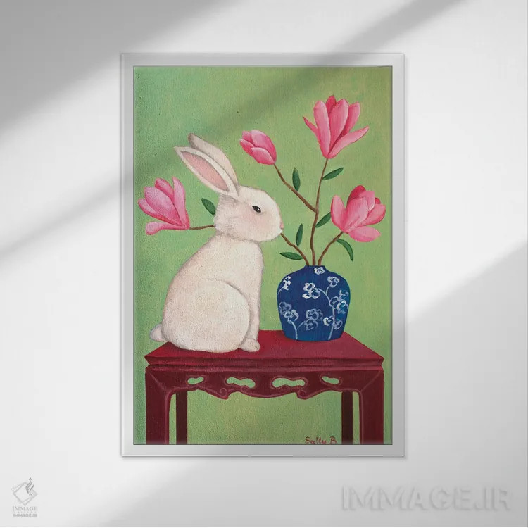 تابلو دکوراتیو خرگوش روی میز چین وار اثر سالی بی - نمای قابدار سفید