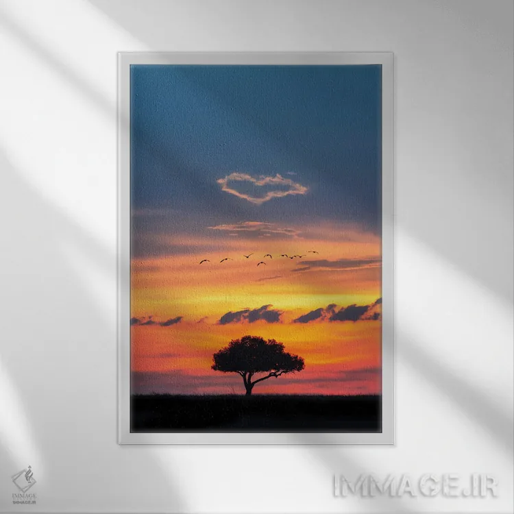 تابلو دکوراتیو غروب آفریقا با شکل قلب در ابرها اثر سوزان ریچی - نمای قابدار سفید