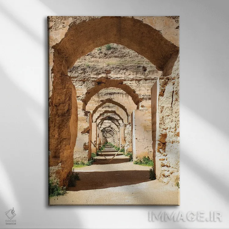 تابلو دکوراتیو Morocco. Stone archways at the Royal Stables,مکناس، مراکش. ط… اثر جولی سیندا - نمای روبهرو روی دیوار