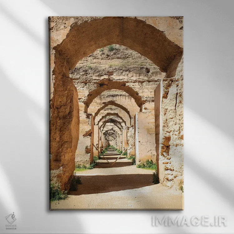 تابلو دکوراتیو Morocco. Stone archways at the Royal Stables,مکناس، مراکش. ط… اثر جولی سیندا - نمای روبهرو روی دیوار