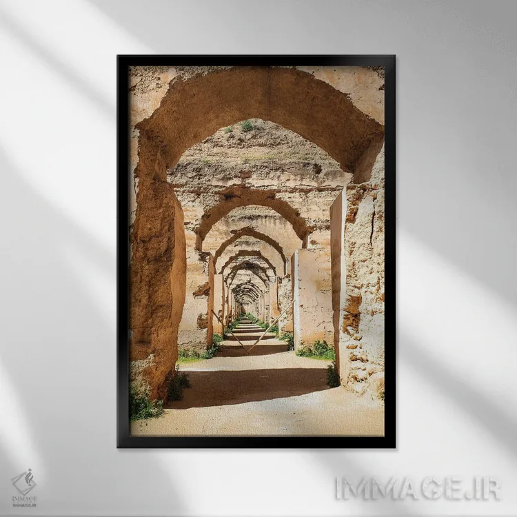 تابلو دکوراتیو Morocco. Stone archways at the Royal Stables,مکناس، مراکش. ط… اثر جولی سیندا - نمای قابدار مشکی