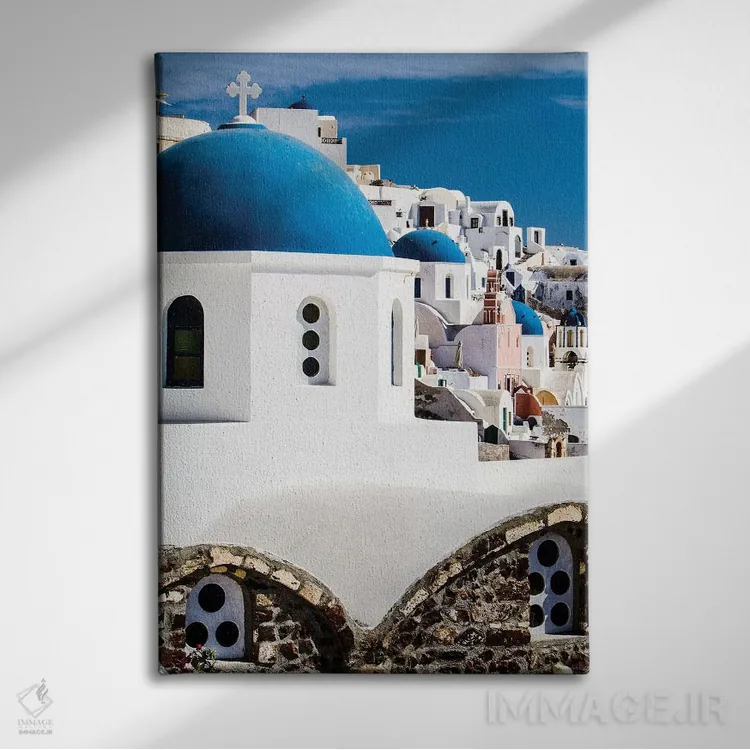 تابلو دکوراتیو Greece. Row of Greek Orthodox Churches with blue domes.,اویا… اثر جولی سیندا - نمای روبهرو روی دیوار