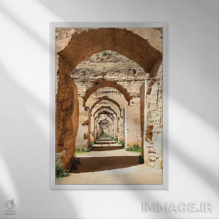 تابلو دکوراتیو Morocco. Stone archways at the Royal Stables,مکناس، مراکش. ط… اثر جولی سیندا - نمای قابدار سفید